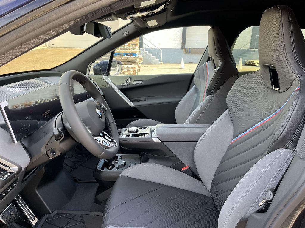 new 2026 BMW iX car, priced at $103,220