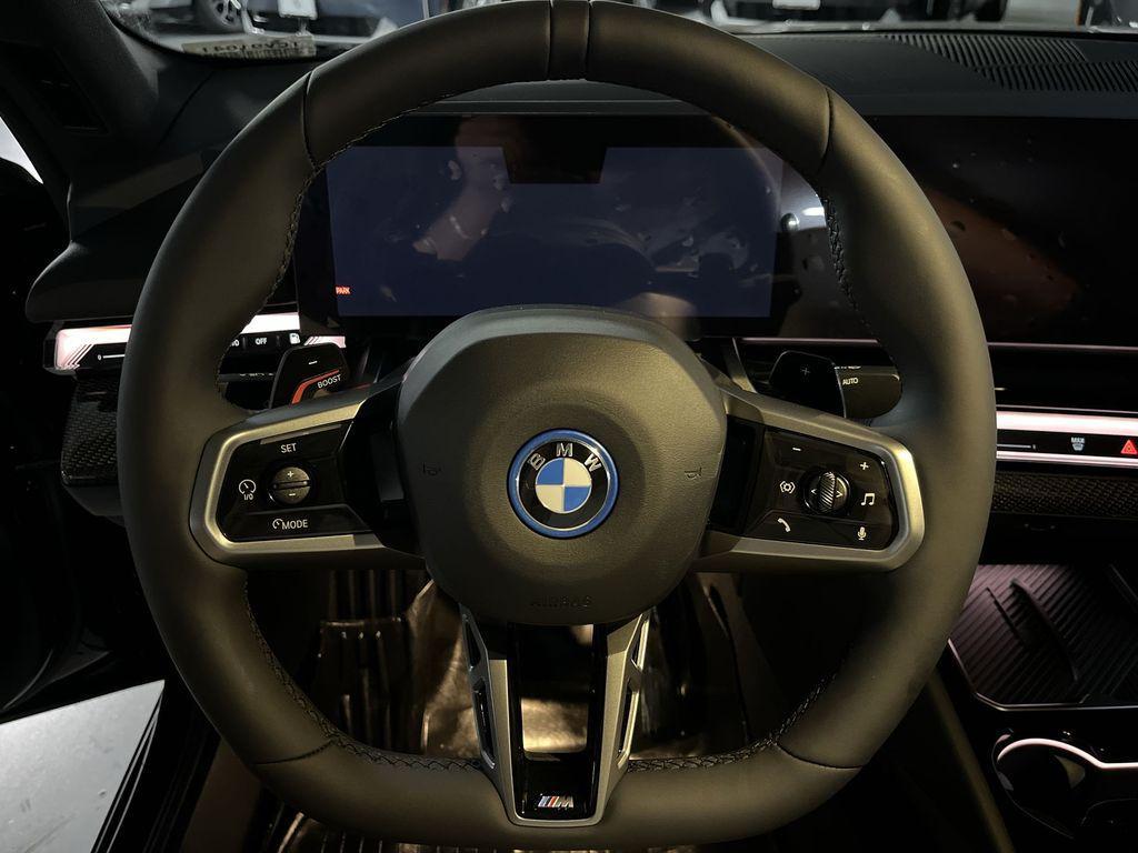 used 2026 BMW 550e car, priced at $82,790