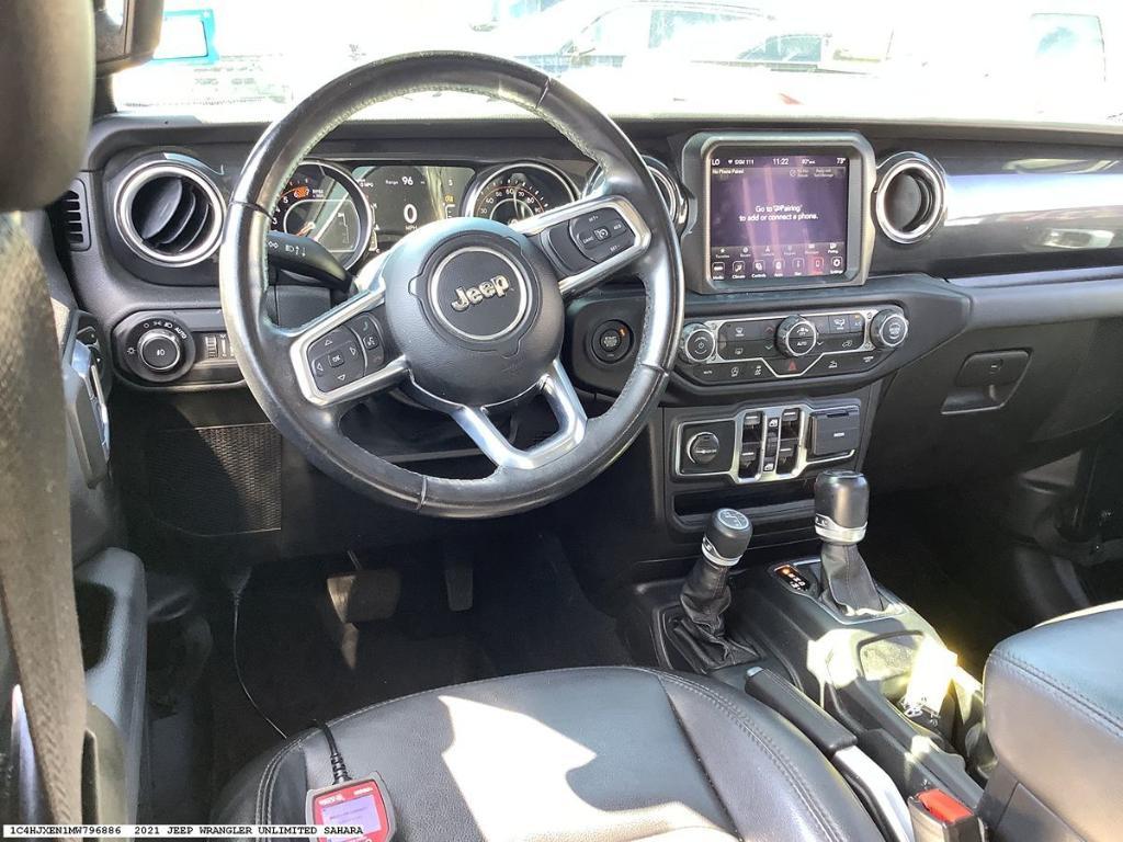 used 2021 Jeep Wrangler Unlimited car, priced at $35,062