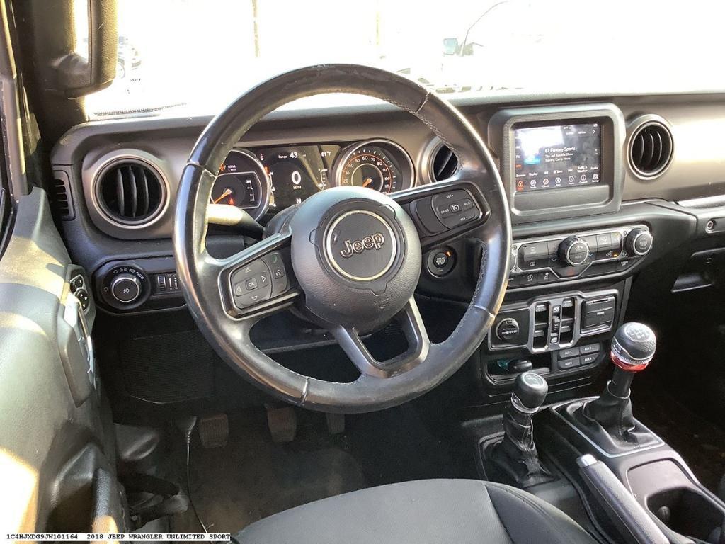 used 2018 Jeep Wrangler Unlimited car, priced at $24,674