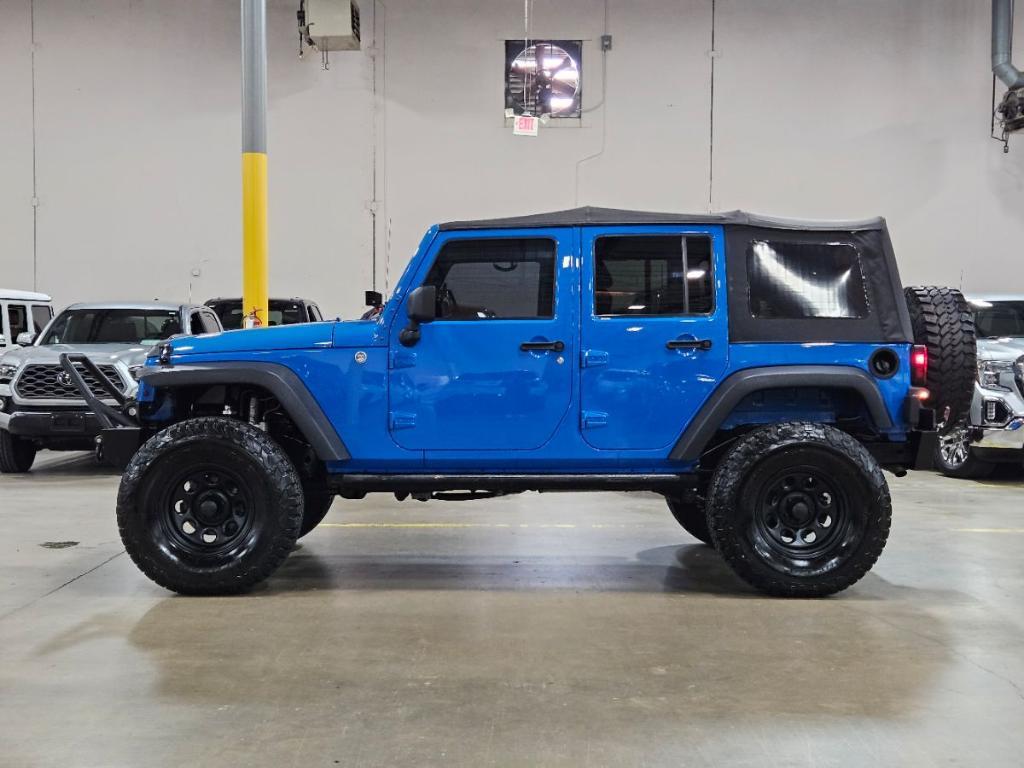 used 2011 Jeep Wrangler Unlimited car, priced at $16,997