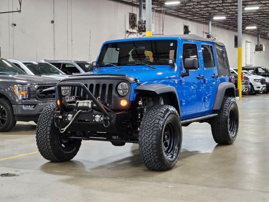 used 2011 Jeep Wrangler Unlimited car, priced at $16,997