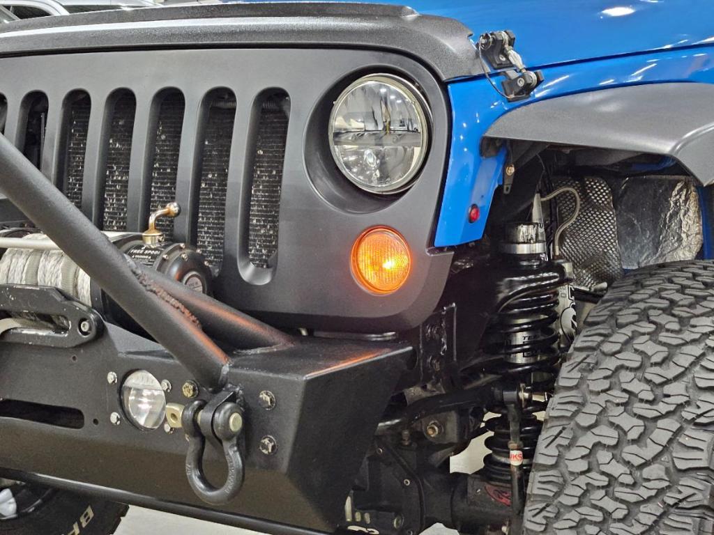 used 2011 Jeep Wrangler Unlimited car, priced at $16,997