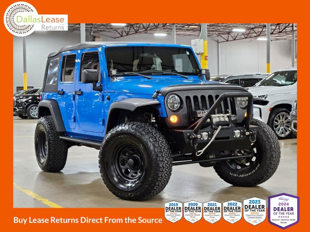 used 2011 Jeep Wrangler Unlimited car, priced at $16,997