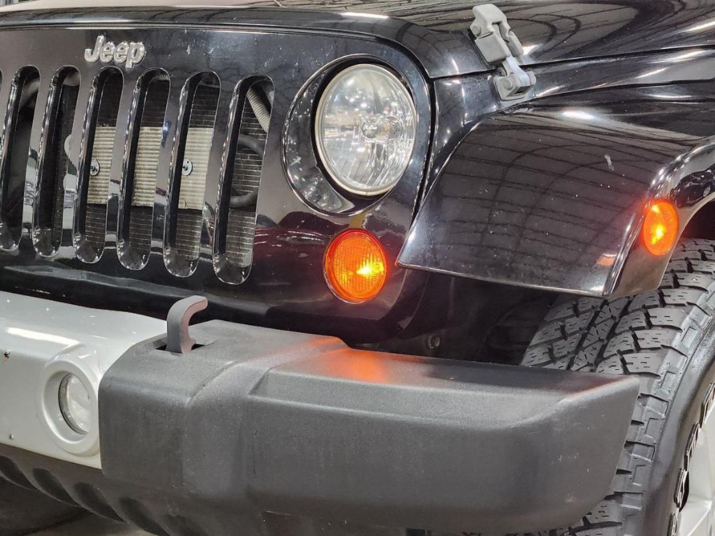 used 2010 Jeep Wrangler Unlimited car, priced at $15,860