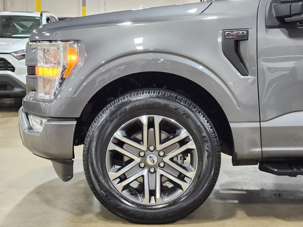 used 2021 Ford F-150 car, priced at $32,167