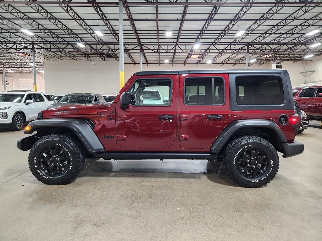 used 2021 Jeep Wrangler Unlimited car, priced at $31,612