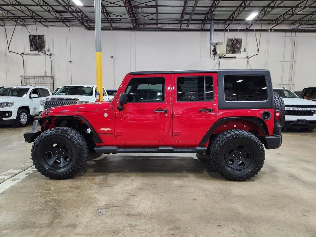 used 2014 Jeep Wrangler Unlimited car, priced at $17,544