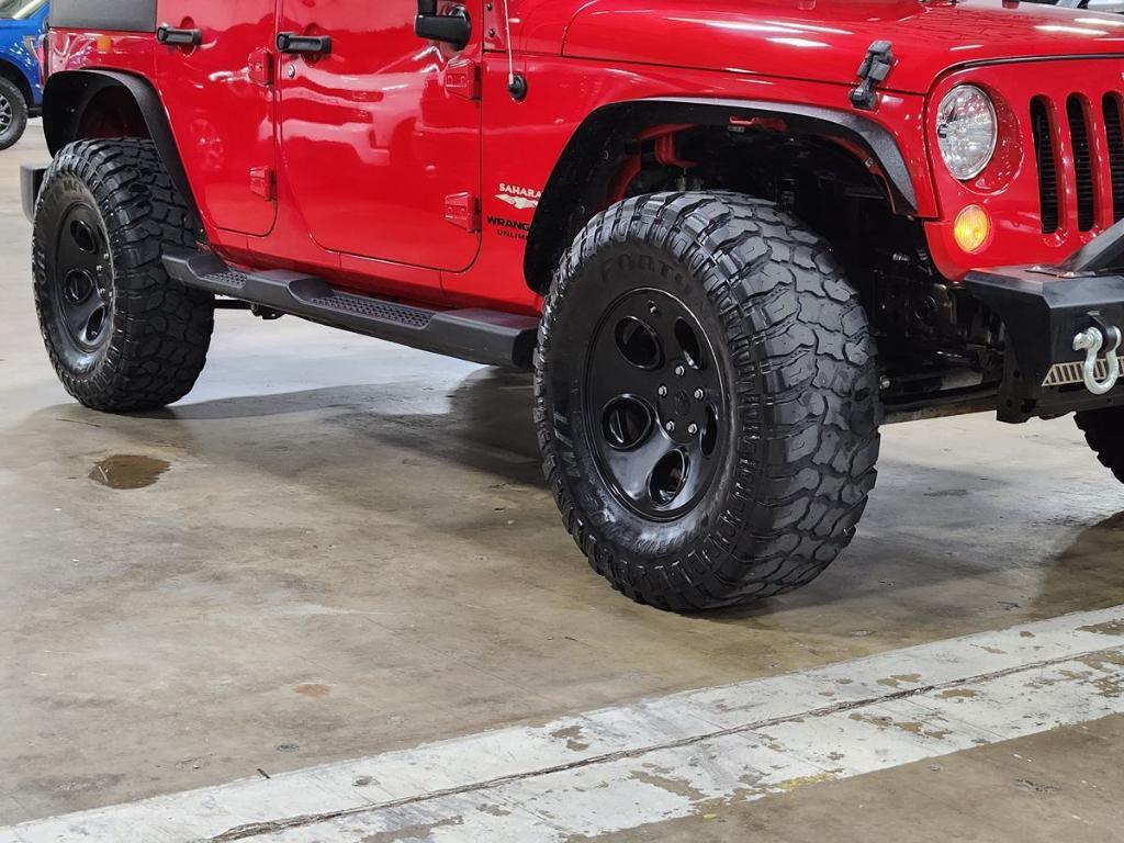 used 2014 Jeep Wrangler Unlimited car, priced at $17,544