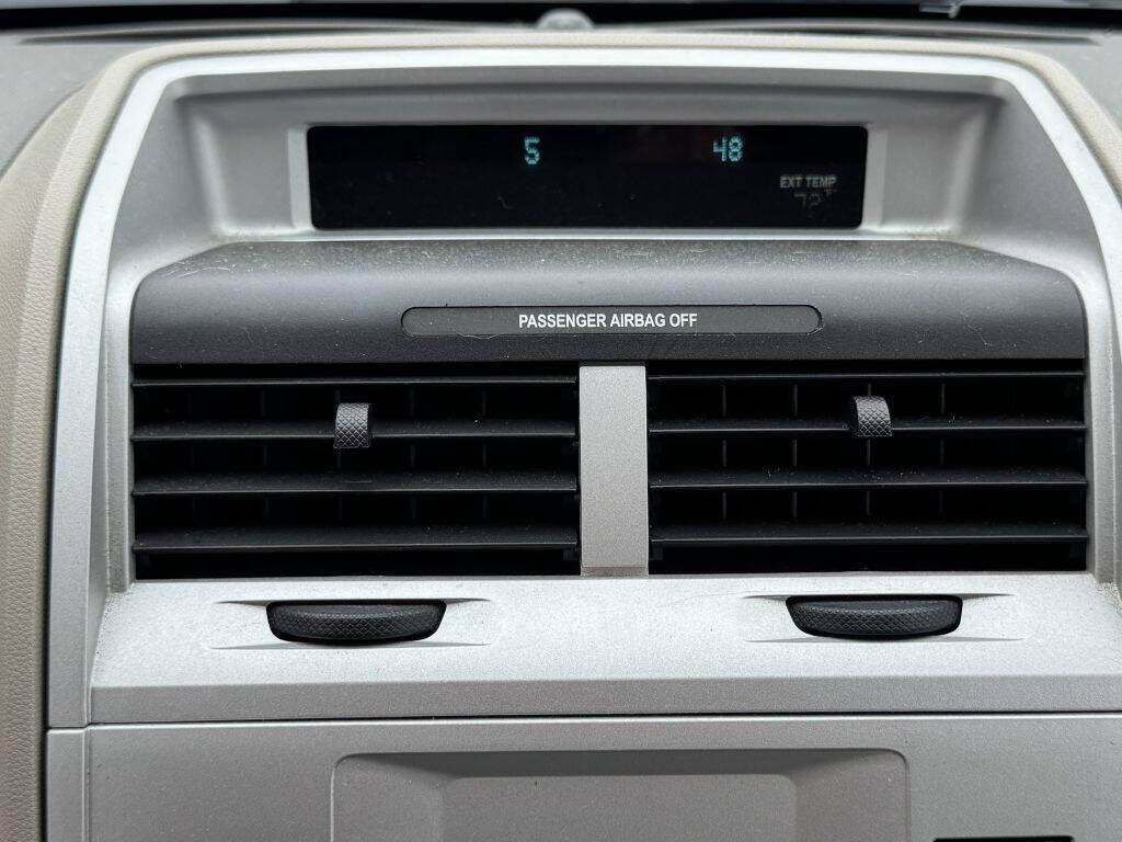 used 2010 Mercury Mariner car, priced at $4,995