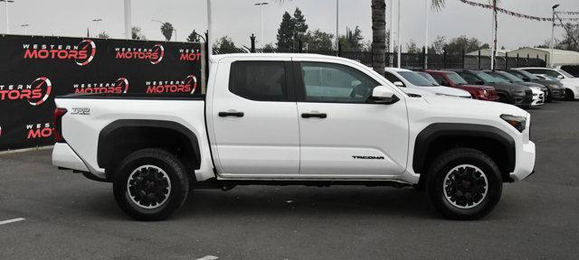 used 2024 Toyota Tacoma car, priced at $38,900