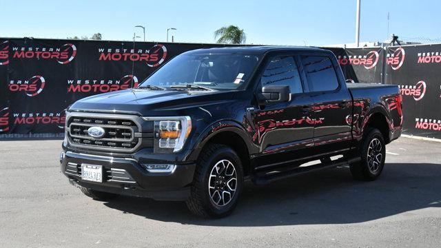 used 2023 Ford F-150 car, priced at $37,944