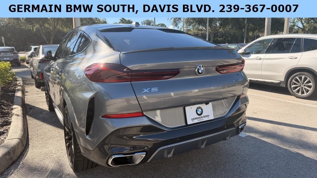 used 2024 BMW X6 car, priced at $72,381