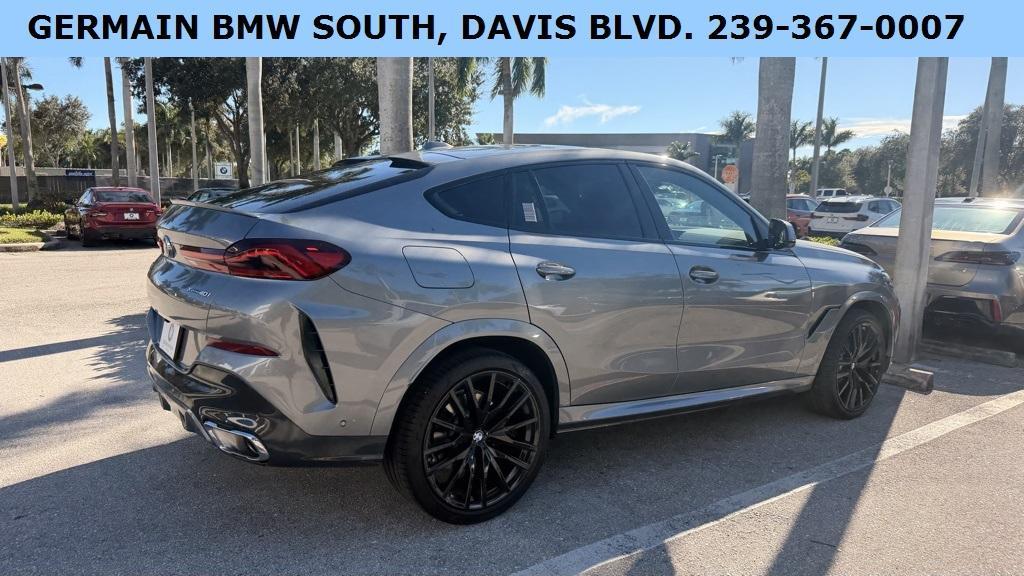 used 2024 BMW X6 car, priced at $72,381