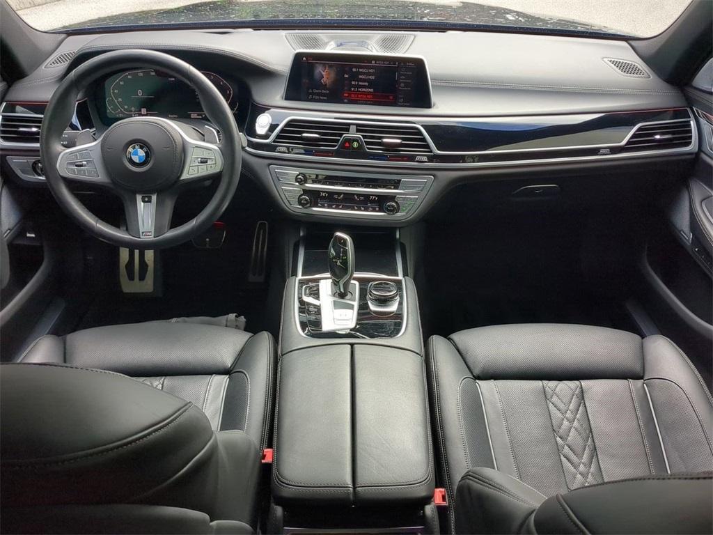 used 2022 BMW 750 car, priced at $67,452