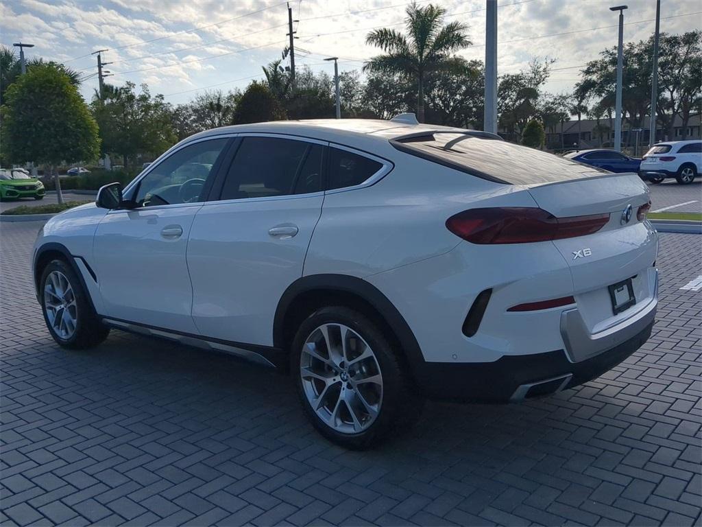 used 2022 BMW X6 car, priced at $56,601