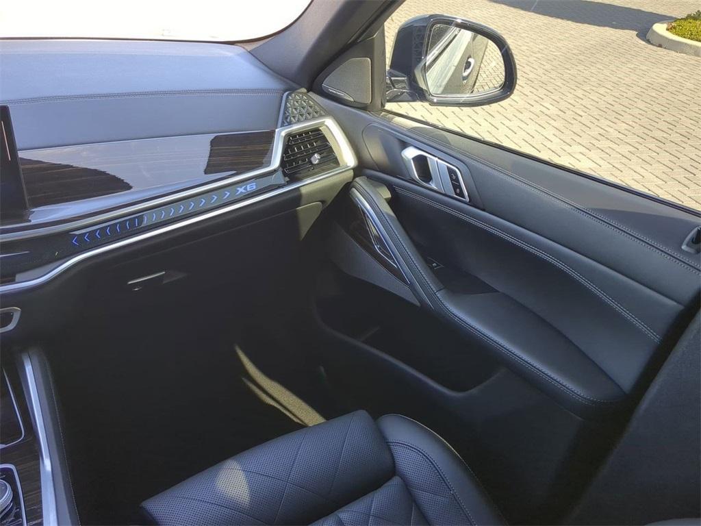 used 2024 BMW X6 car, priced at $67,536