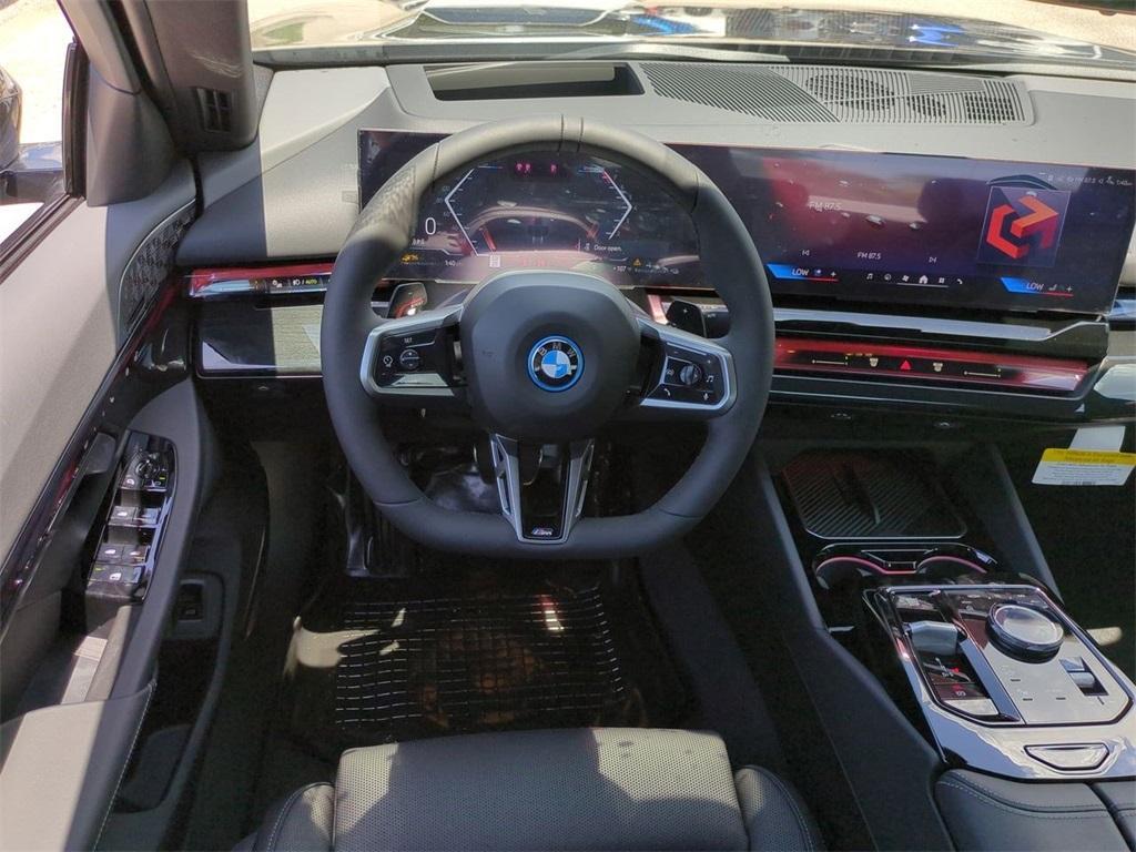 new 2026 BMW 550e car, priced at $88,185