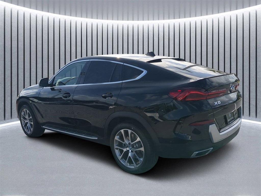 used 2022 BMW X6 car, priced at $55,860