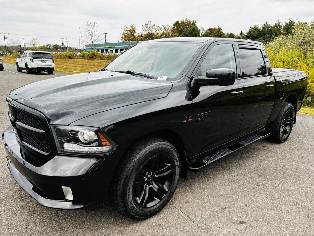 used 2018 Ram 1500 car, priced at $28,801