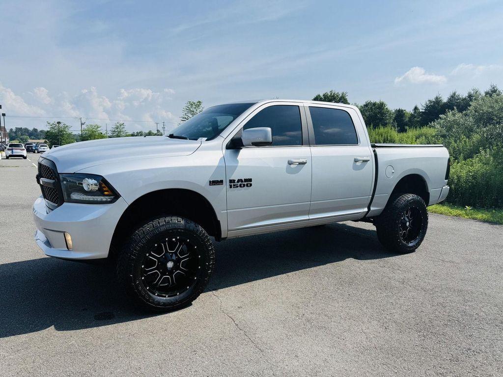used 2018 Ram 1500 car, priced at $30,496