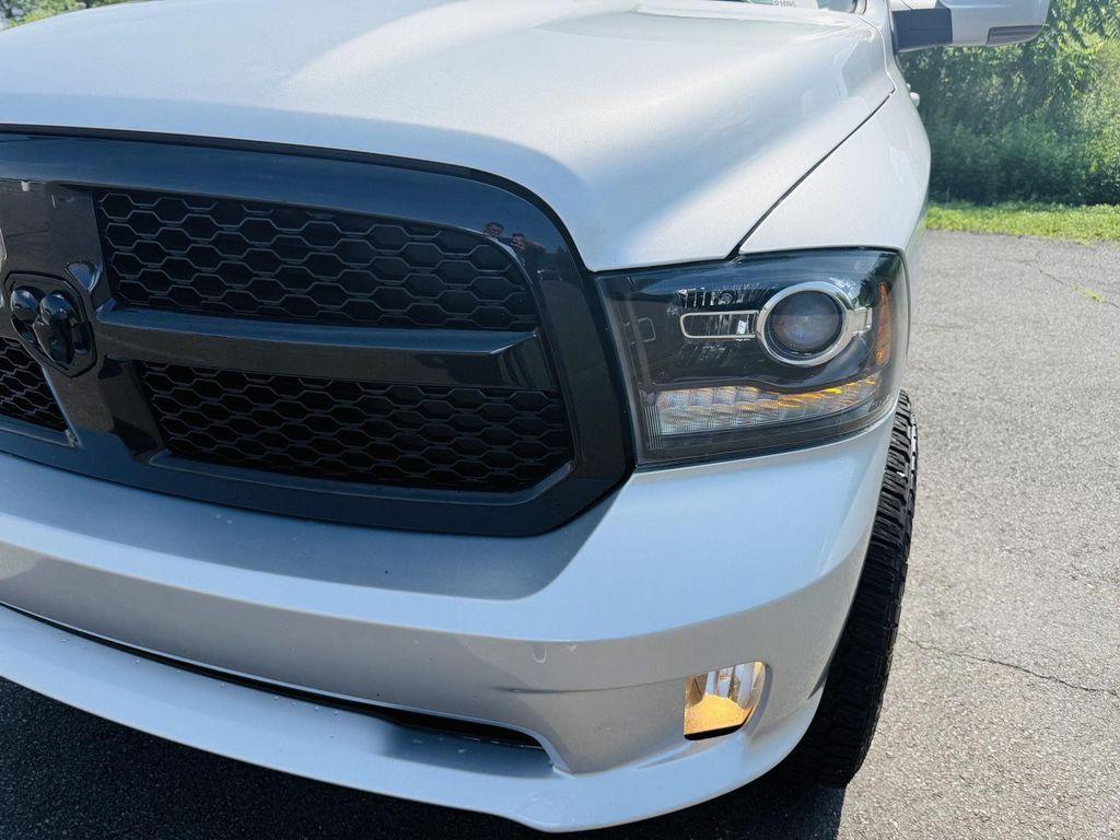 used 2018 Ram 1500 car, priced at $30,496