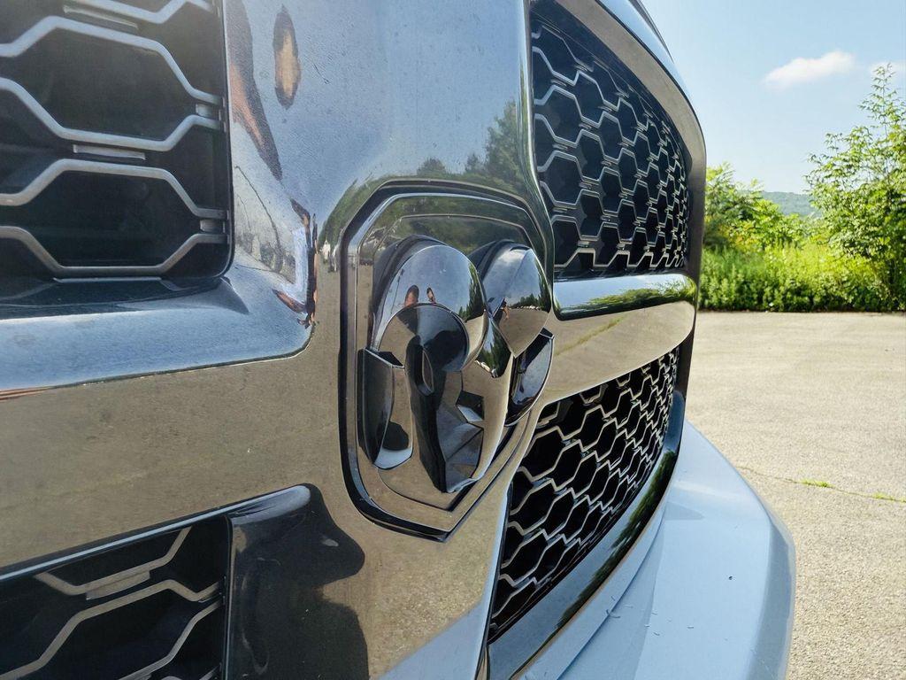 used 2018 Ram 1500 car, priced at $30,496