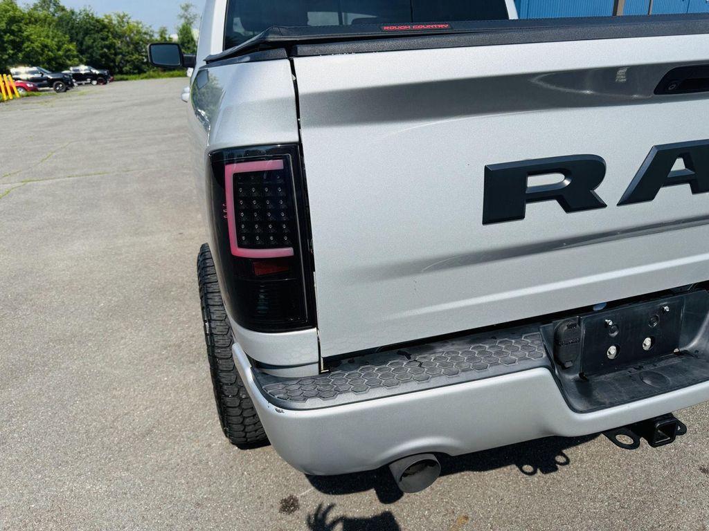 used 2018 Ram 1500 car, priced at $30,496