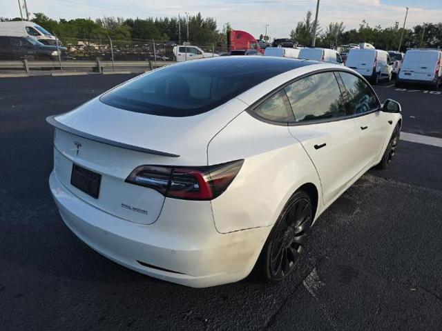 used 2022 Tesla Model 3 car, priced at $21,999