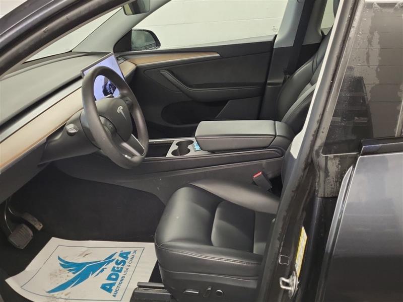 used 2024 Tesla Model Y car, priced at $28,999