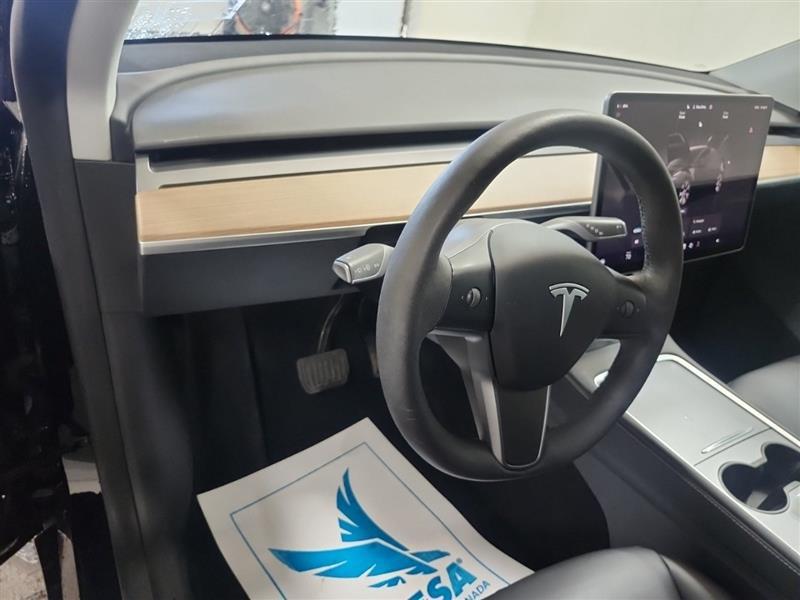 used 2023 Tesla Model Y car, priced at $24,999