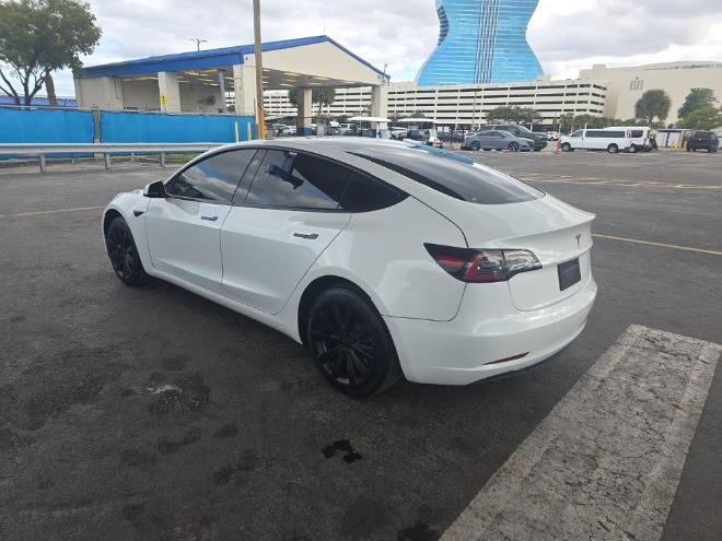 used 2023 Tesla Model 3 car, priced at $19,999