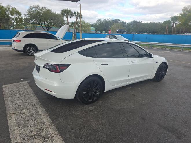 used 2023 Tesla Model 3 car, priced at $19,999