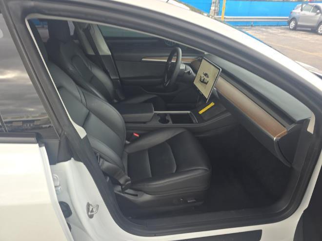 used 2023 Tesla Model 3 car, priced at $19,999