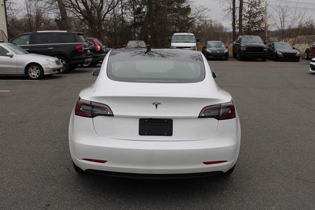 used 2022 Tesla Model 3 car, priced at $19,450