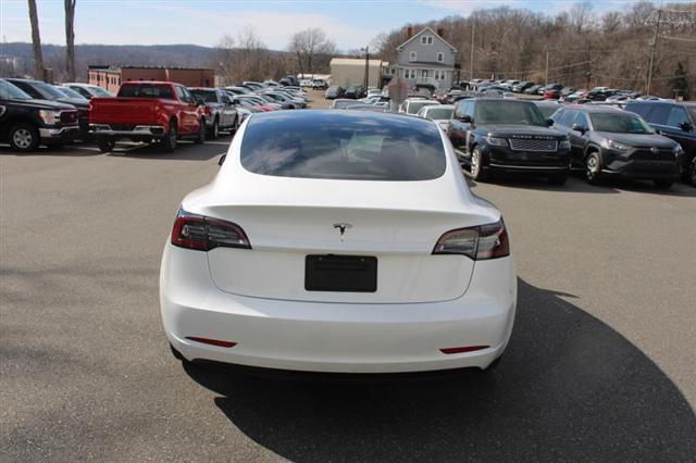 used 2023 Tesla Model 3 car, priced at $19,450