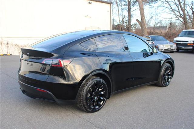 used 2023 Tesla Model Y car, priced at $28,750