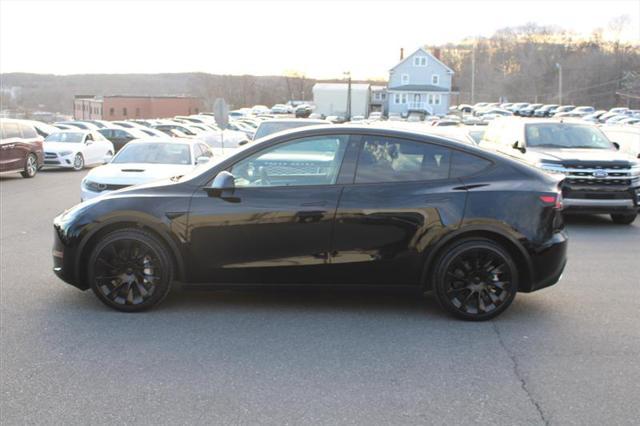 used 2023 Tesla Model Y car, priced at $28,750