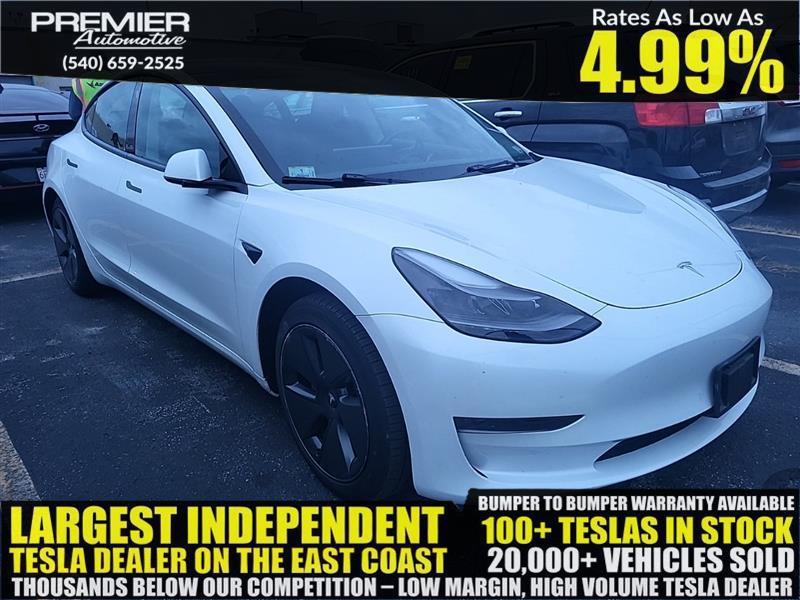 used 2023 Tesla Model 3 car, priced at $19,999