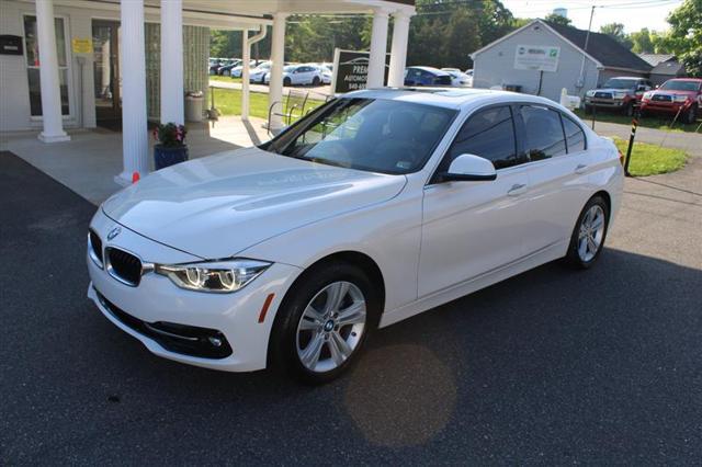 used 2018 BMW 330 car, priced at $16,250