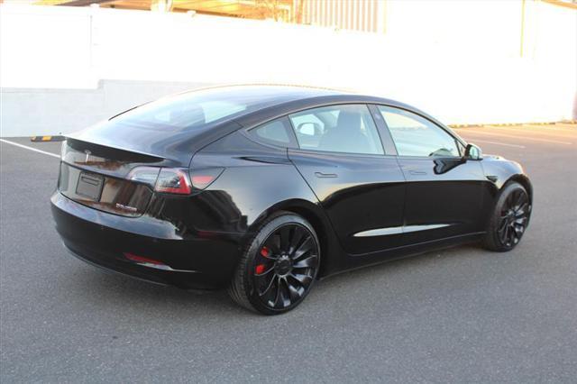 used 2022 Tesla Model 3 car, priced at $19,450