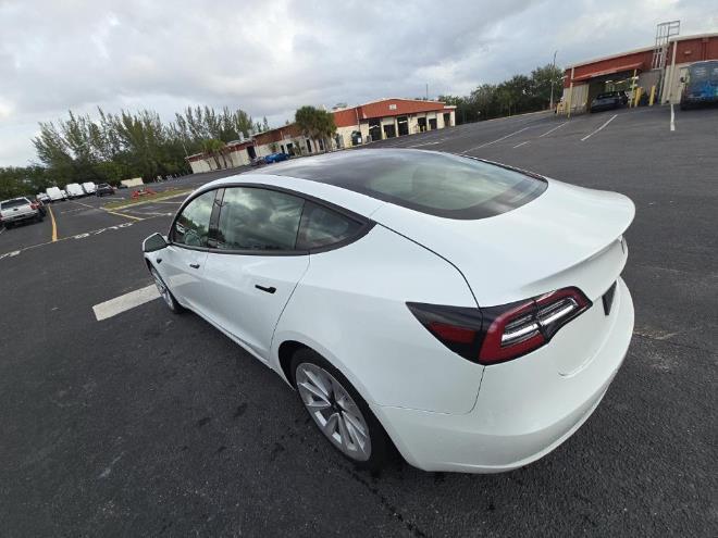 used 2023 Tesla Model 3 car, priced at $20,999