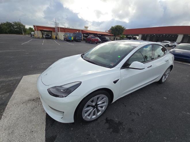 used 2023 Tesla Model 3 car, priced at $20,999