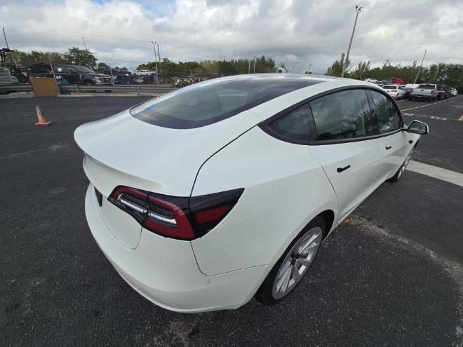 used 2023 Tesla Model 3 car, priced at $20,999