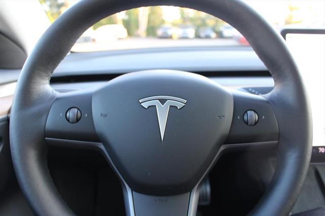 used 2023 Tesla Model 3 car, priced at $31,750