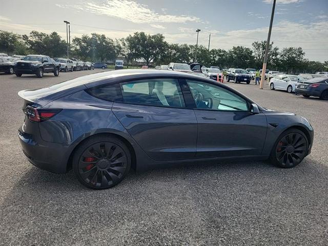 used 2023 Tesla Model 3 car, priced at $22,999