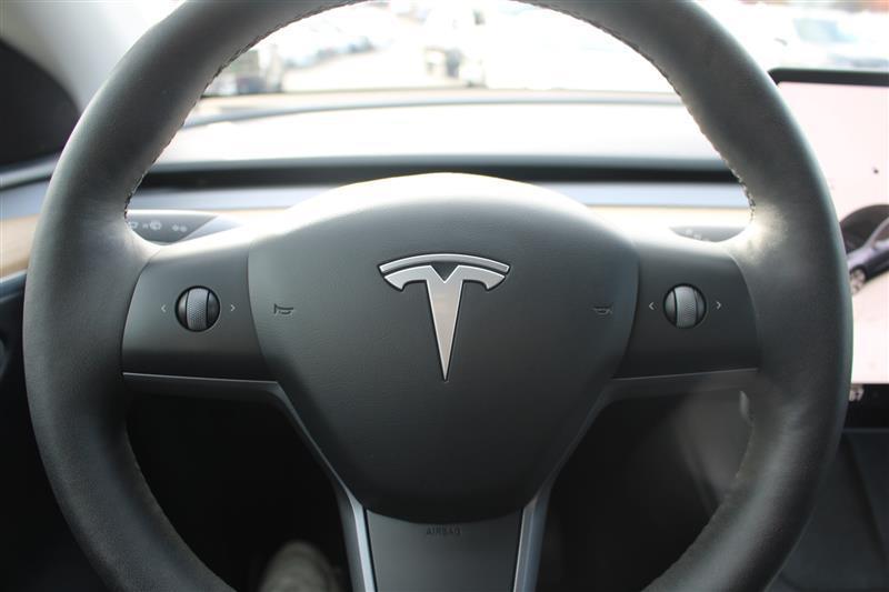 used 2024 Tesla Model Y car, priced at $29,999