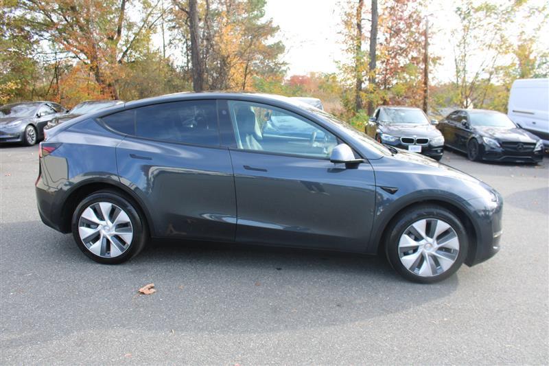 used 2024 Tesla Model Y car, priced at $29,999