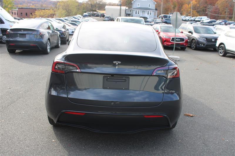 used 2024 Tesla Model Y car, priced at $29,999