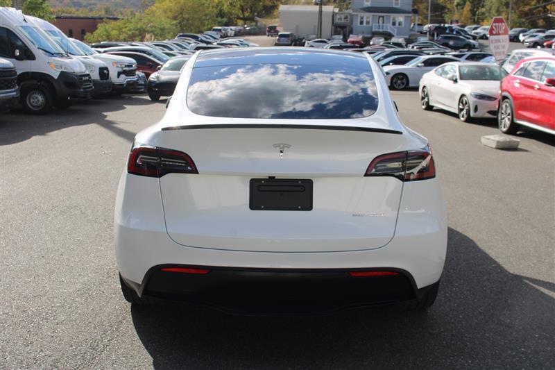 used 2024 Tesla Model Y car, priced at $27,999